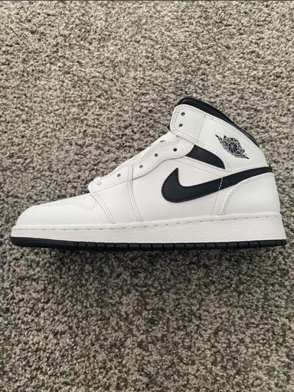 Jordan 1 Mid White/Black Men’s High-Top Sneakers